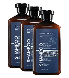 Three brown bottles of Particle Men's Formula shampoo with blue labels.