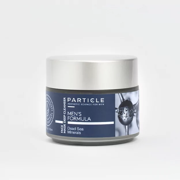 Particle Men's Formula Face Mask Deep Cleanser in a round, silver-lidded jar with Dead Sea Minerals label.