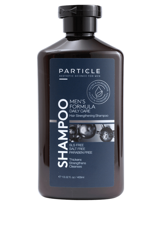 Particle For Men hair strengthening shampoo in brown bottle on white background.